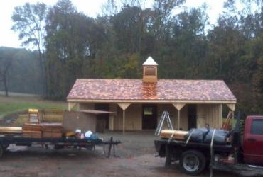 Custom horse stall barn with cedar shake