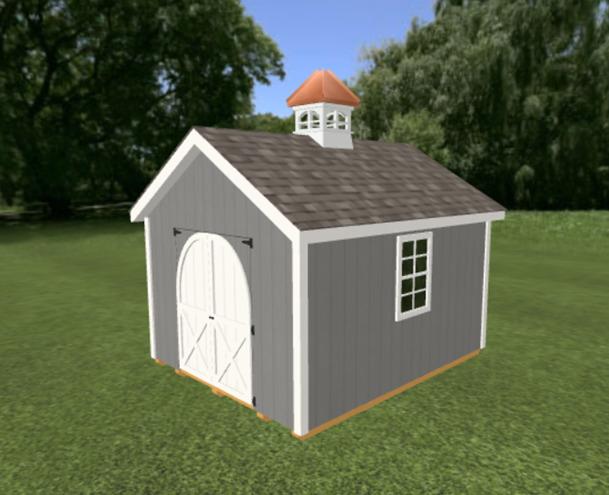 A small shed on grass with custom cupola and gray siding