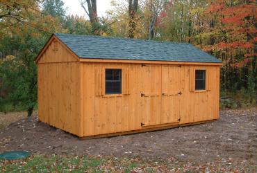 aframe board and batten shed with cedartone stain 