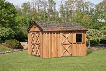 Aframe Cedar Board and Batten Shed shown with optional crossbuck on doors.