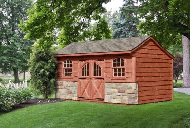 Quaker Shed with Stone and Heritage Lap Siding
