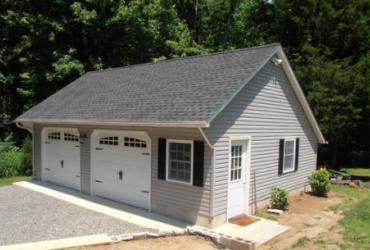 custom vinyl 2 story quaker garage