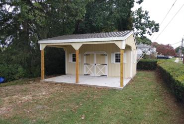 custom board and batten shed with overhang