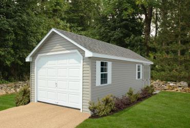 Tan vinyl A-frame single car garage