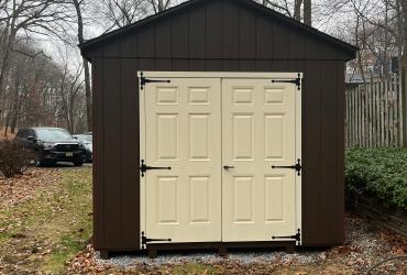 double doors on 2-tone shed.