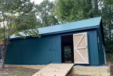 Dark Green Shed with double door and ramp