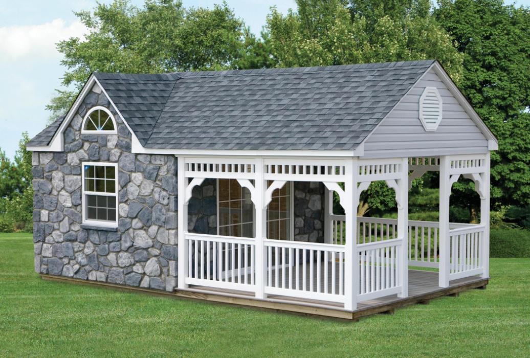 AFrame Guest House with dormer, stone vernier siding and porch