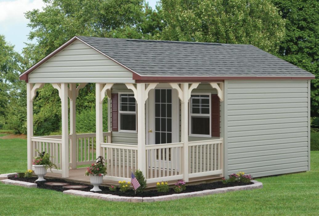 guest/ pool house with vinyl siding and porch..