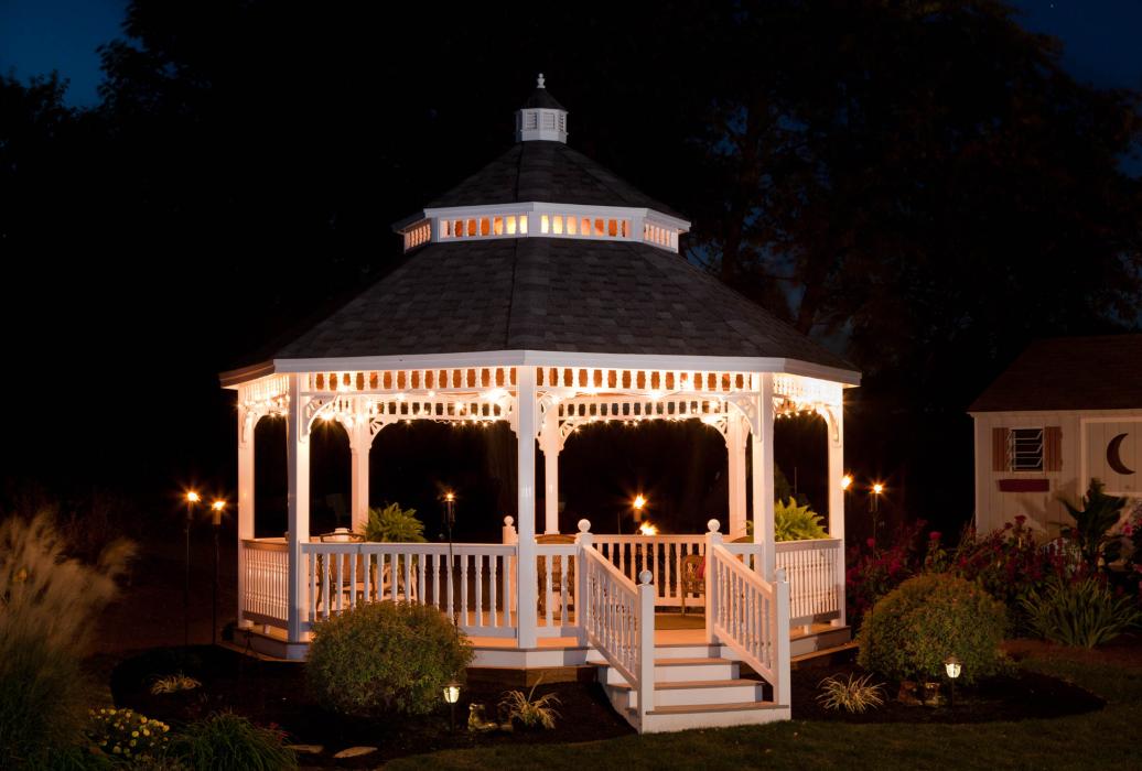 Vinyl Octagon Gazebo with Cathedral Roofline-4 Vinyl Octagon Gazebo with Cathedral Roofline shown at night with lights