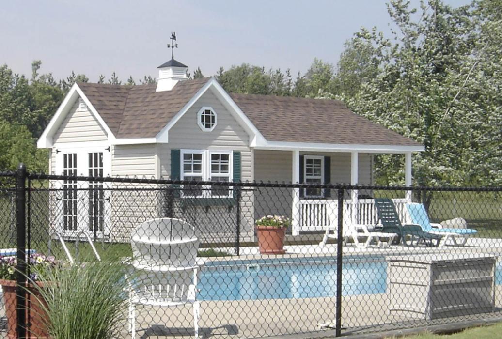 Classic Vinyl Victorian shed with porch by pool