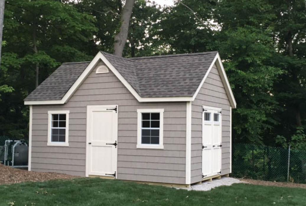 New England Classic Victorian shed with custom vinyl siding and dormer