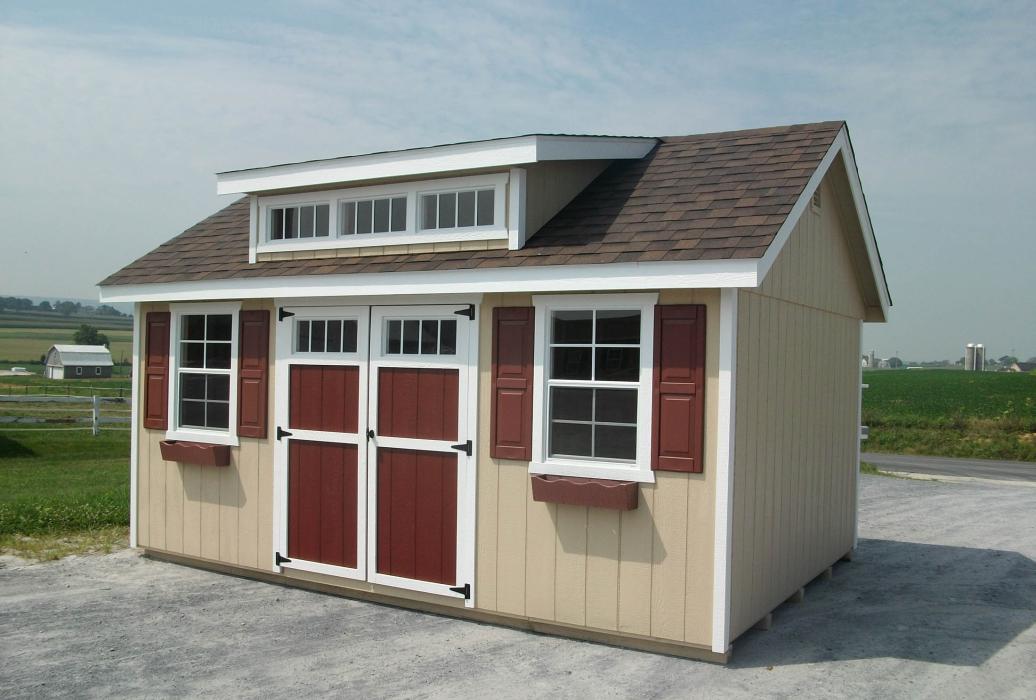 Classic Shed with Dormer (not deluxe)  7/12 roof pitch -This pitch will allow door on eave side for the 10 or 12' wide.. Classic Shed with Dormer (not deluxe)T1-11-1 shown on 7/12 roof pitch -Roof pitch brought down to fit door on eave side.