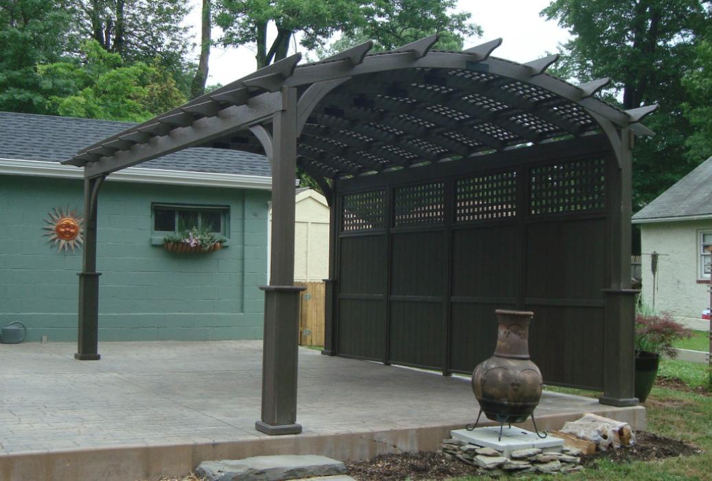 cozy arched cinder stained wood pergola