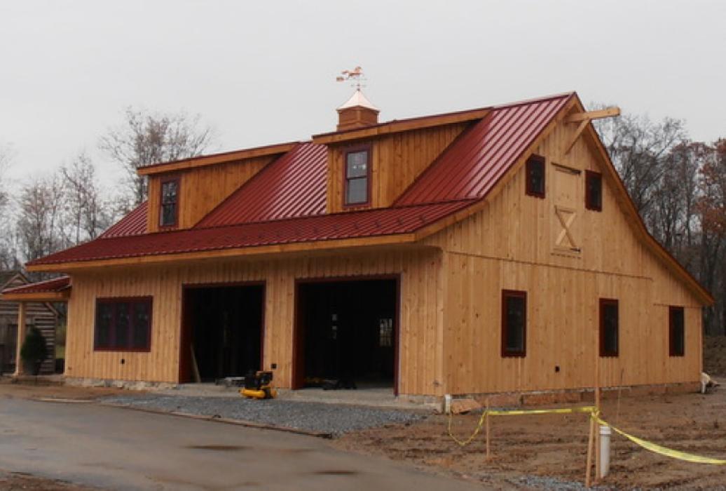 Under Construction Custom Board and Batten Garage with dormers