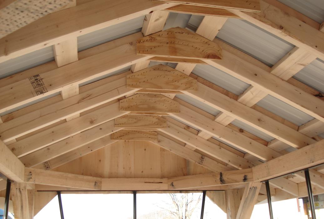 Underside of roof of hay bale feeder