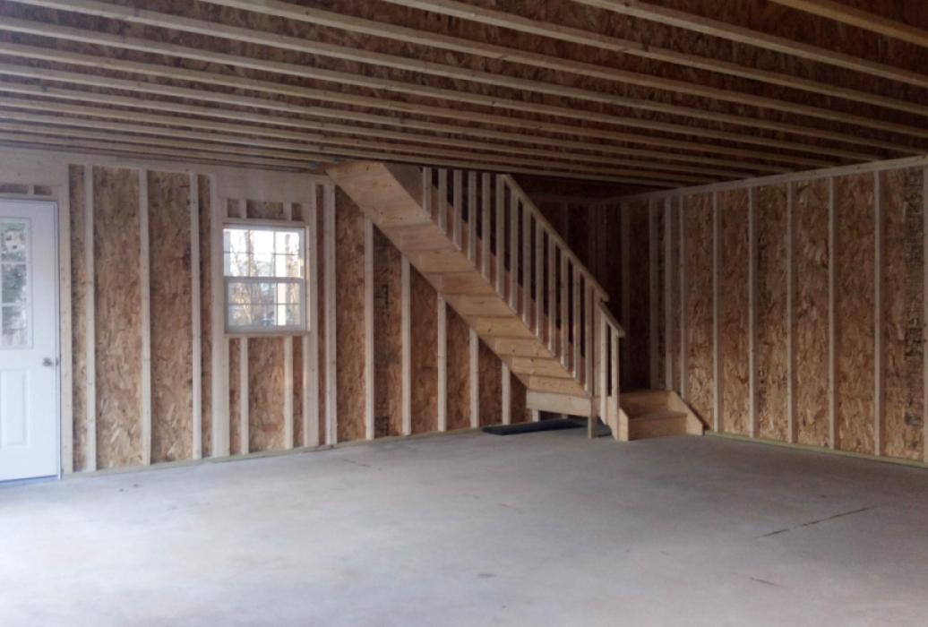 GALLERY 1-5 Inside of garage showing staircase