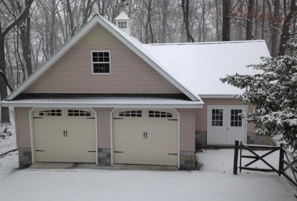 CUSTOM GARAGE Custom two story vinyl garage with cupola