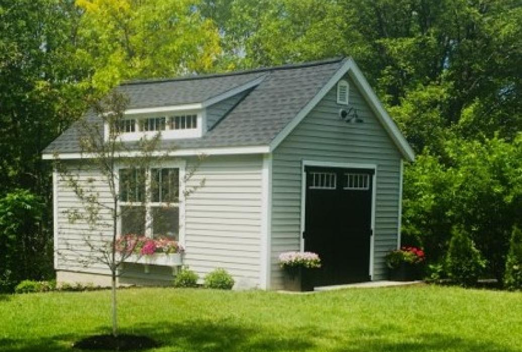 taller walls- available in on site assembly only Classic Vinyl Deluxe Cape Cod with shed dormer