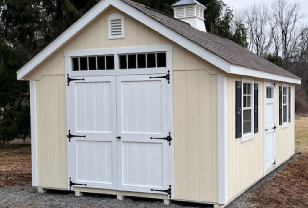 12x20 Cape Cod Navajo white with barkwood shingles