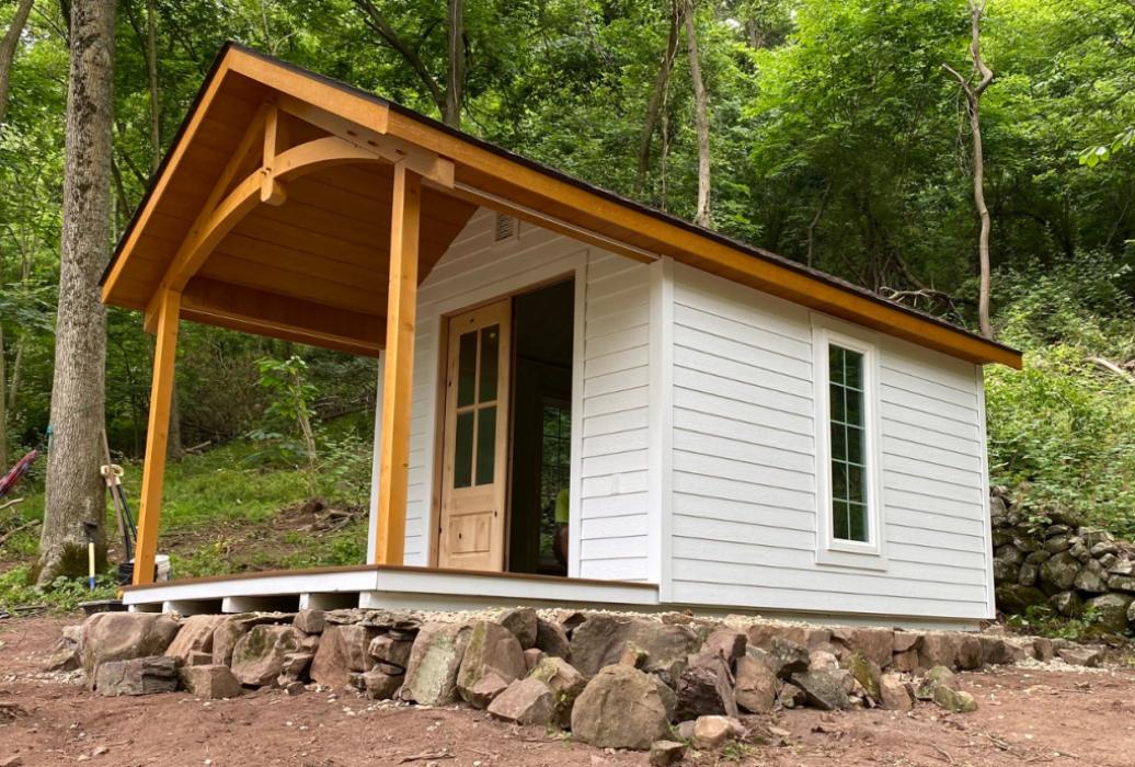 a custom cottage in the heritage cabin style.