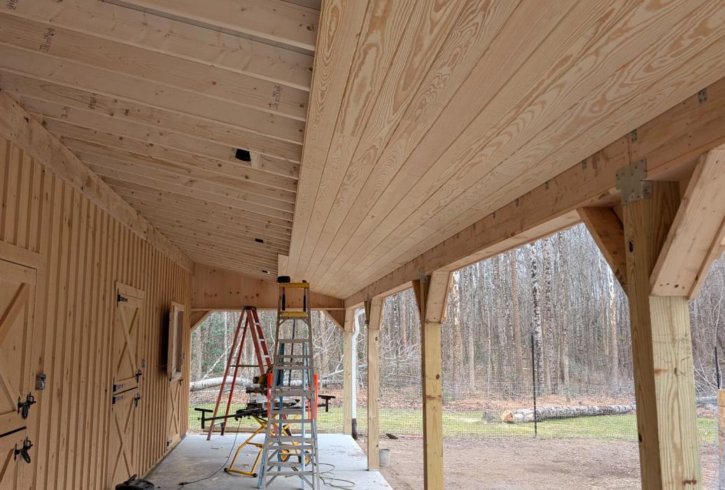Crew installing overhang underside.