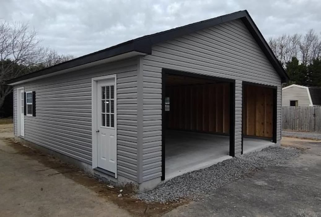 vinyl single story before garage doors are added