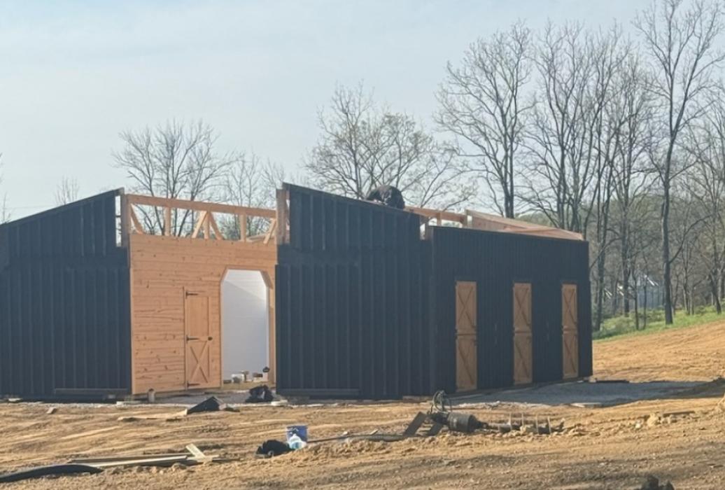 Modular barn set before halves are joined and roof is built. 2
