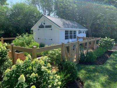 Classic Cape Cod Shed and garden