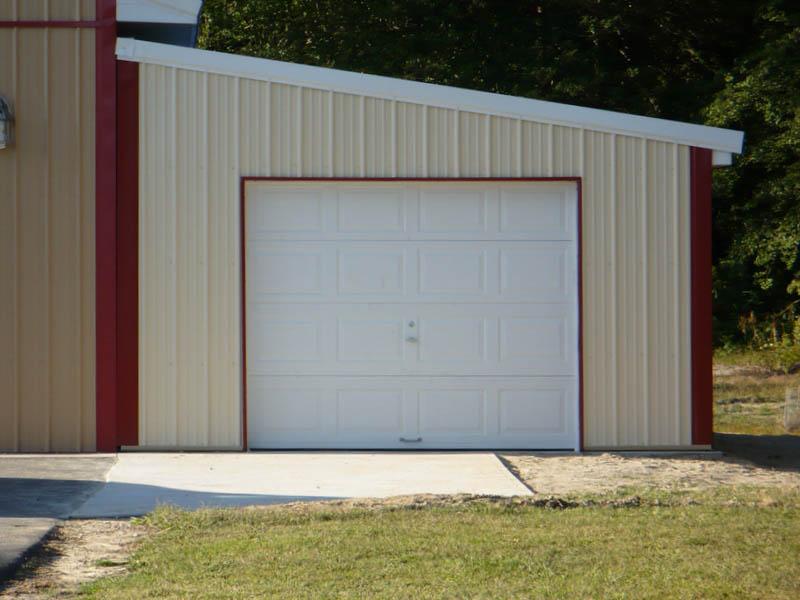 Lean-to single-car garage with metal siding