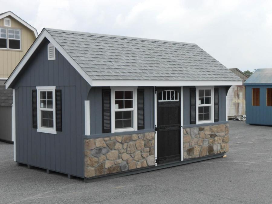 Quaker shed with stone wainscoting, by Lancaster Barns
